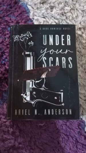 UNDER YOUR SCARS