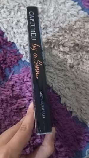 Captured By A Sinner (Sinners Book#5)